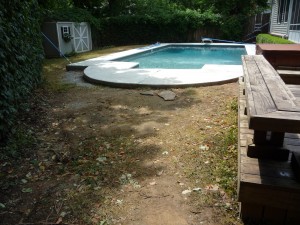 Backyard before our hardscape and landscaping design and installation services